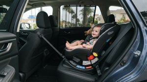 Properly installed child car seat inside a family vehicle in California